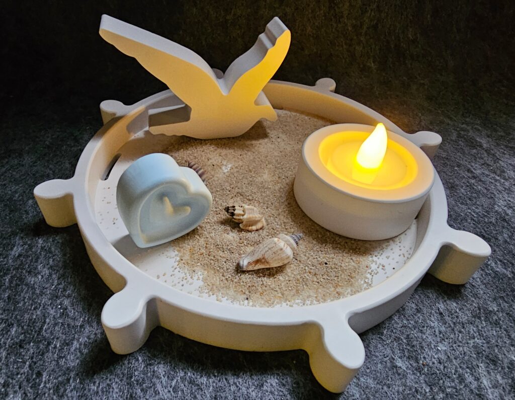 freisesmanufaktur_dekoration_geschenk_mitbringsel_wohndeko_maritim_boot_segel_strand_meer_steuer